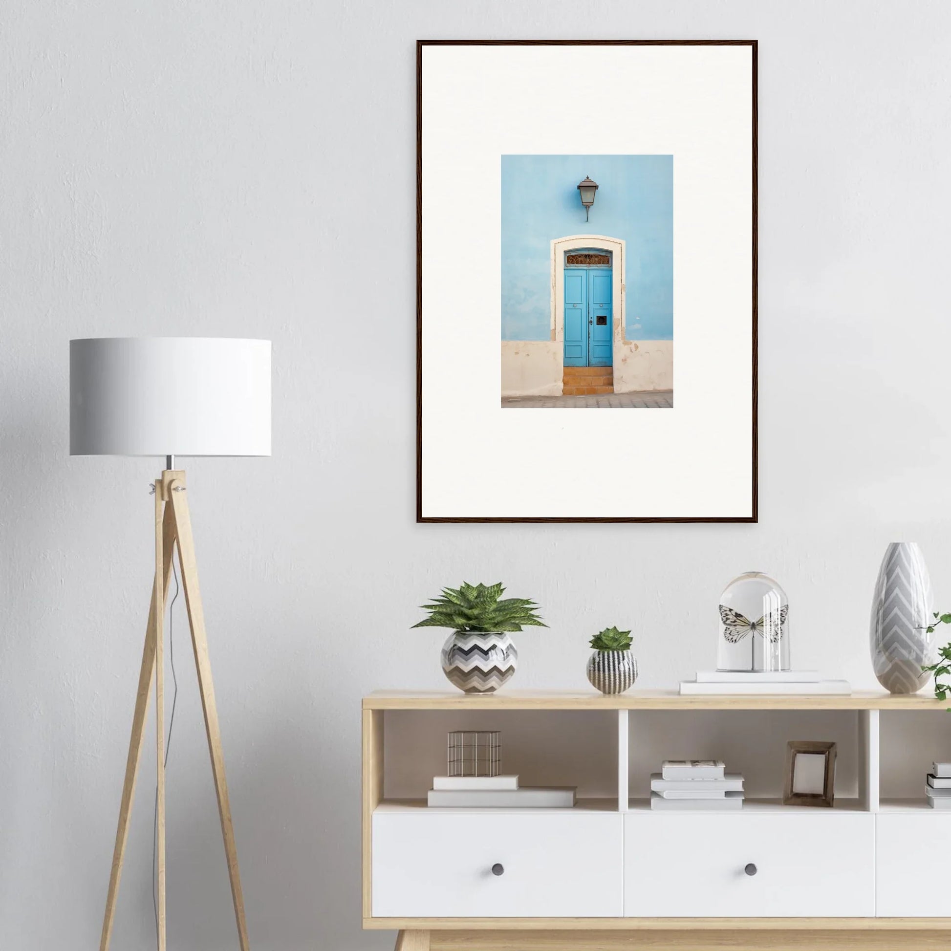 Framed wall art of a bright blue door on beige, perfect for surreal Azure Vesaurrezz fans