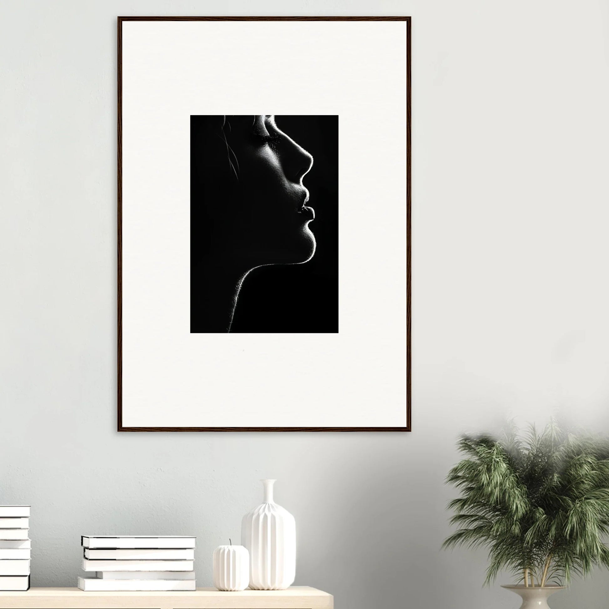 Black and white silhouette portrait in a brown frame for Velvet Void Sensation art