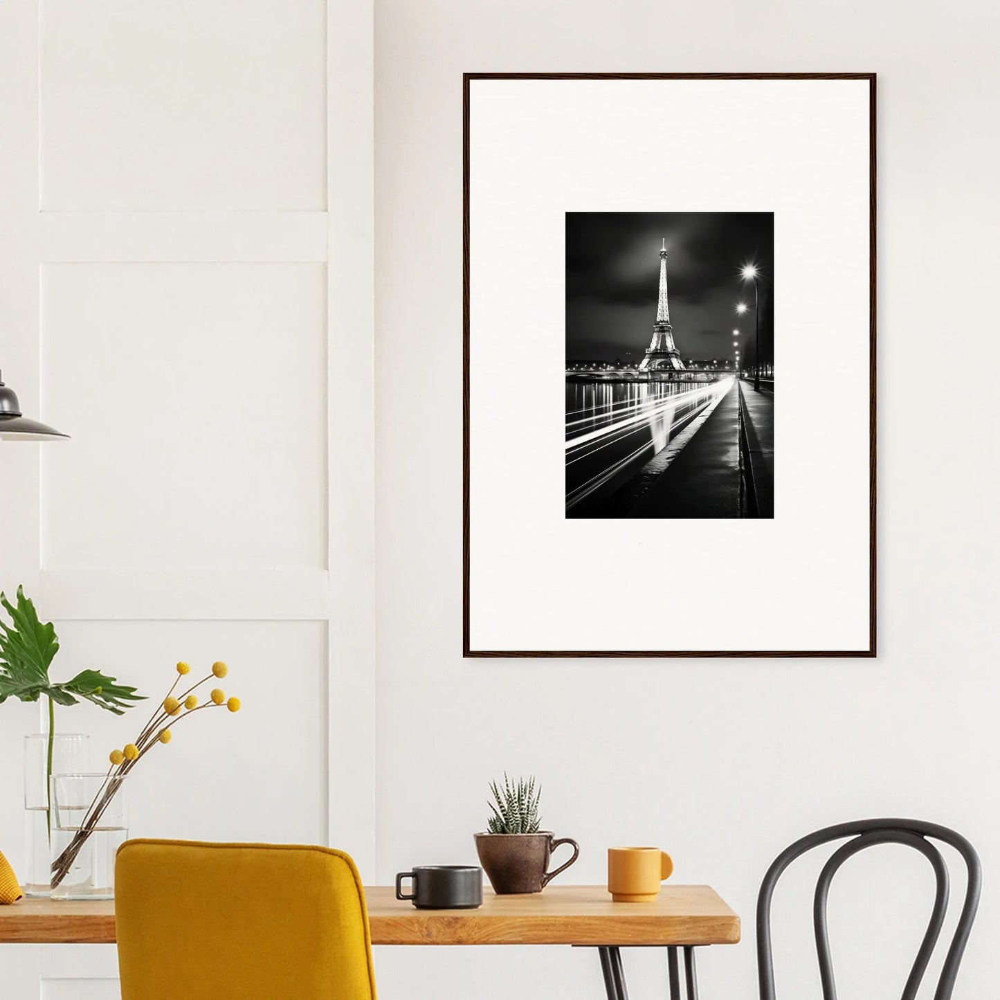 Framed black and white Eiffel Tower night photo with light trails from Ghosts of Luminosity