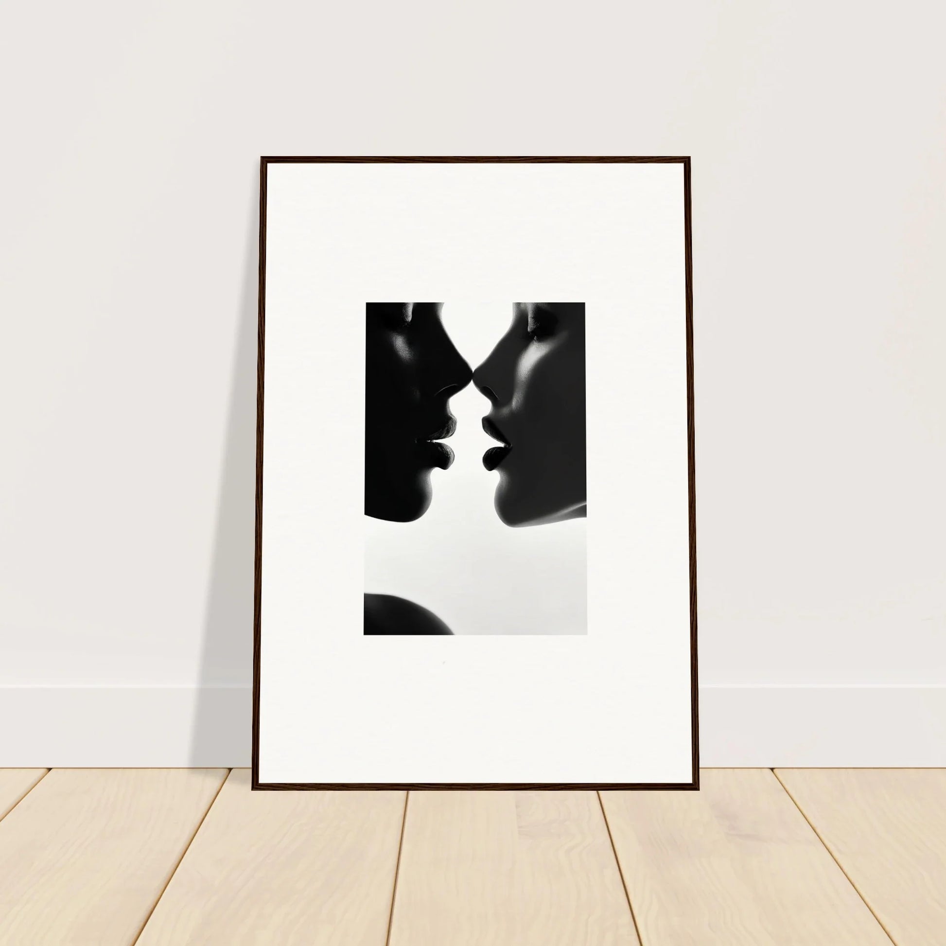 Framed black and white silhouette of a couple kissing from Lattices of Ephemera