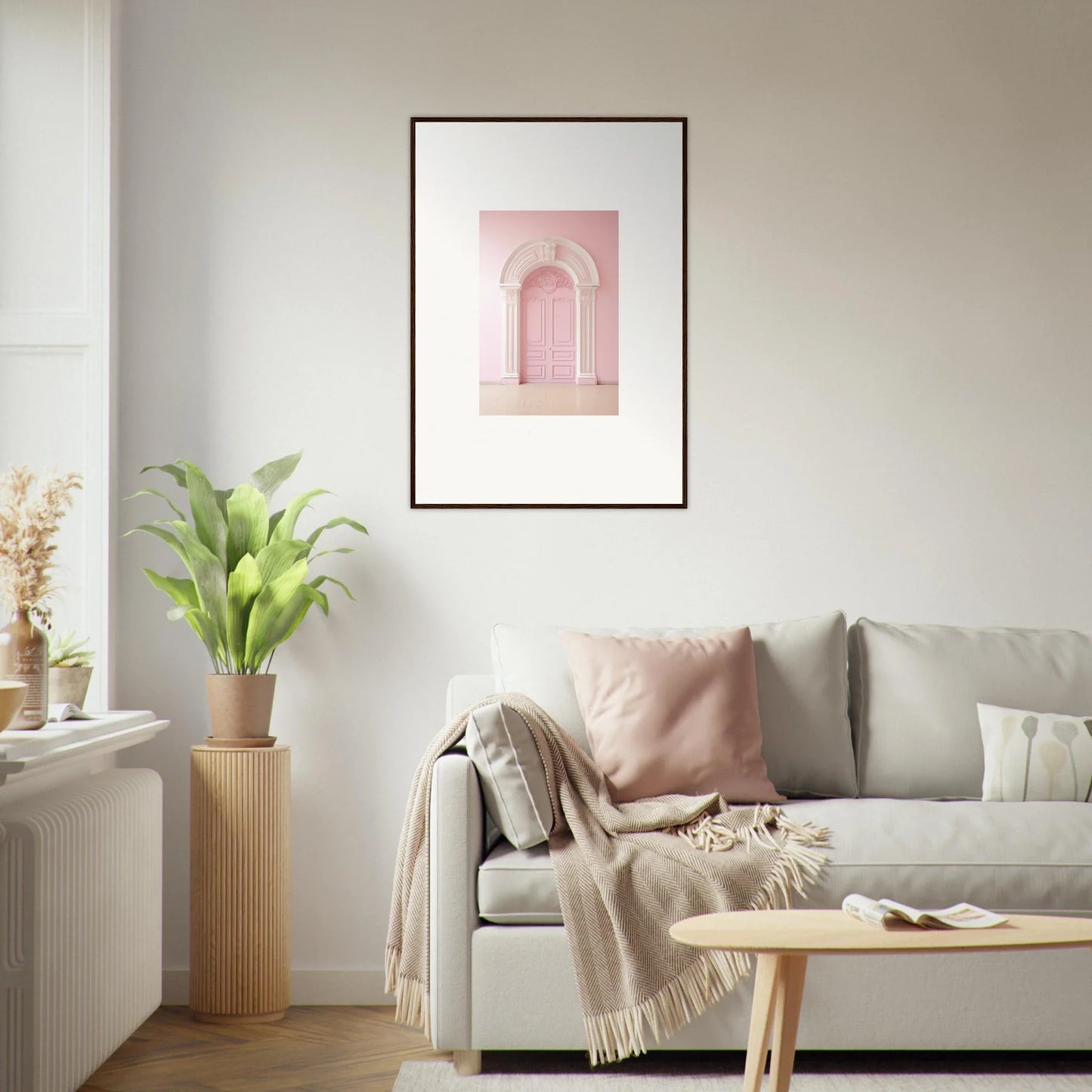 Light gray Portal Fantasies Unfurled sofa with pink and beige pillows and a blanket