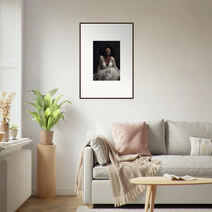 Framed black and white portrait on a white wall from Timeless Essence Laughter collection