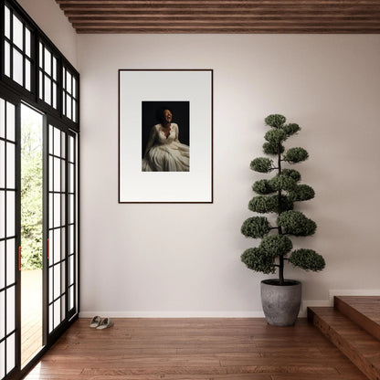 Framed black and white portrait on a white wall from the Luminescent Joy Echoes collection