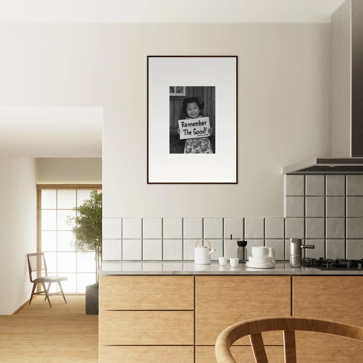 Framed wall art of a black and white photo on a white wall for Essence Savor Whispers