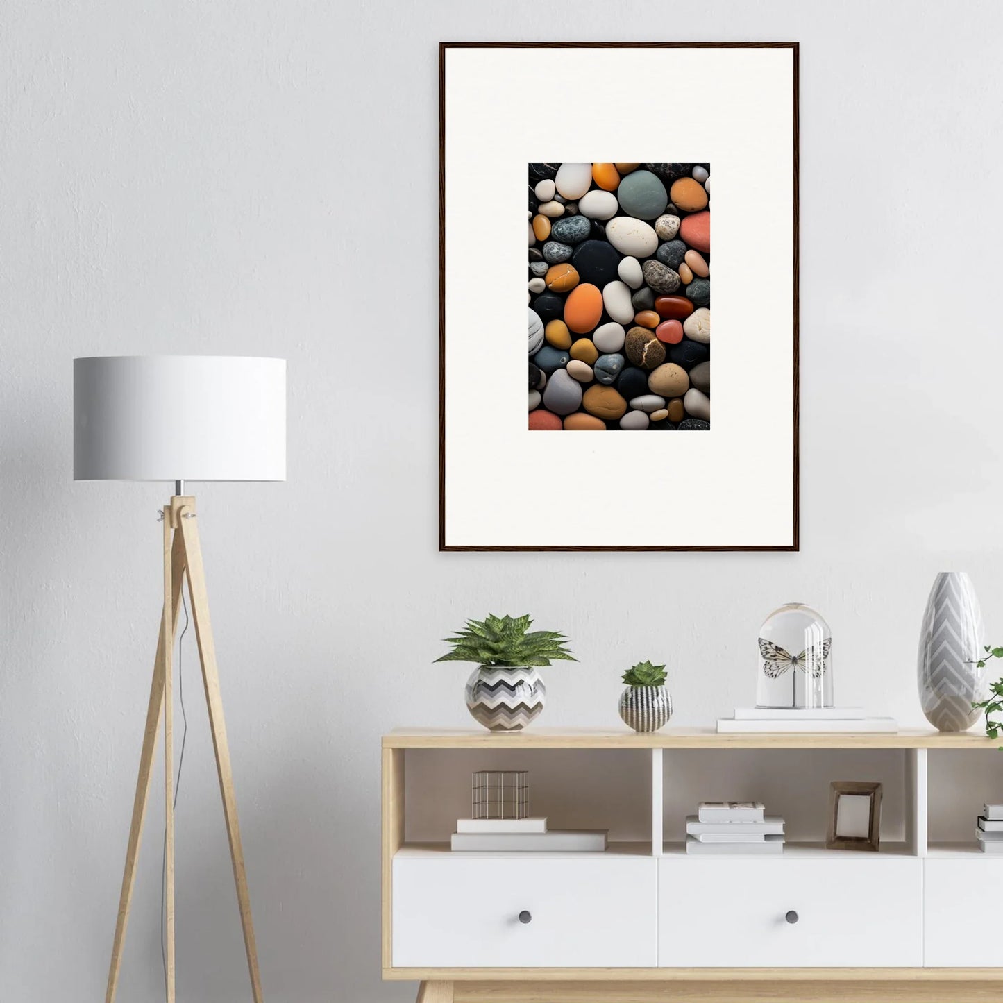 Framed artwork of colorful and grey river rocks for Elemental Whisperbound Ascendancies