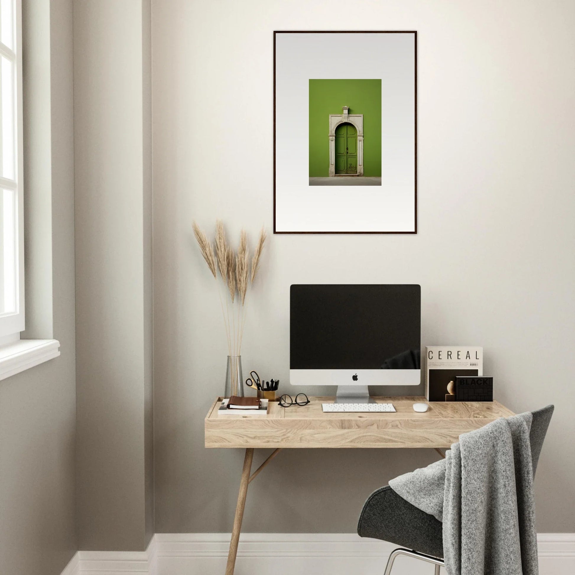 Minimalist wooden desk with iMac and premium framed wall art from Green Origins