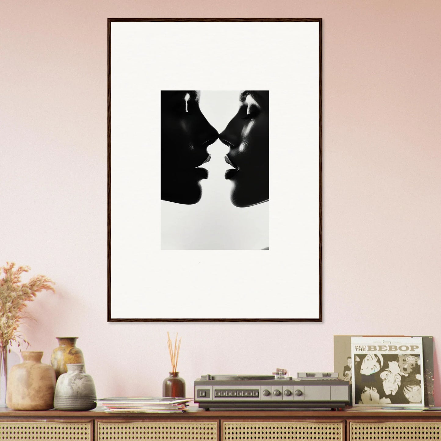 Framed wall art of silhouetted profiles in Eclipsing Soulcare Kisses design