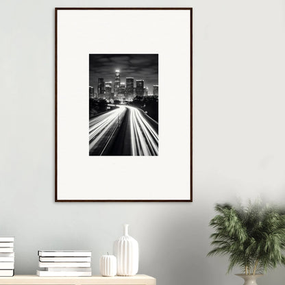 Framed wall art featuring a city skyline with light trails, perfect for modern decor