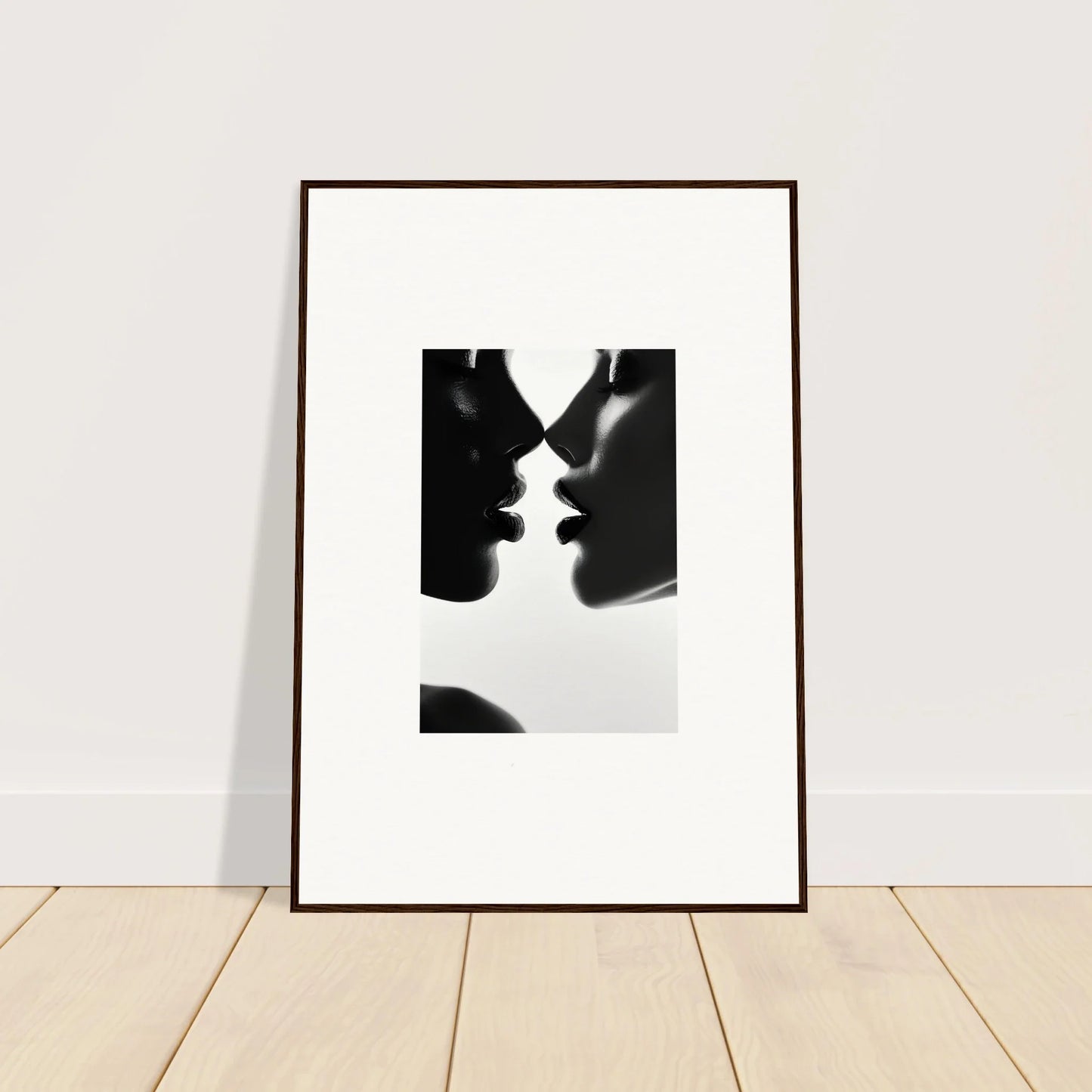 Framed black and white silhouette art of a kiss from Ephemeral Echoes Touch special edition