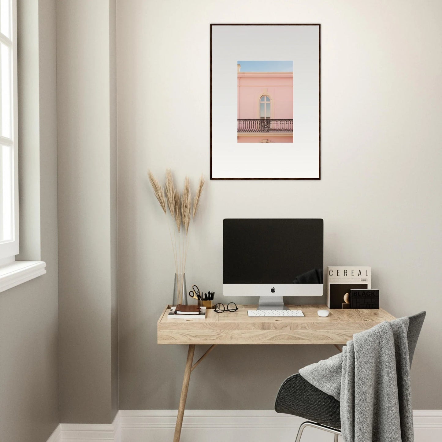 Minimalist wooden desk with iMac in Peach Tranquil Portal featuring simple decor