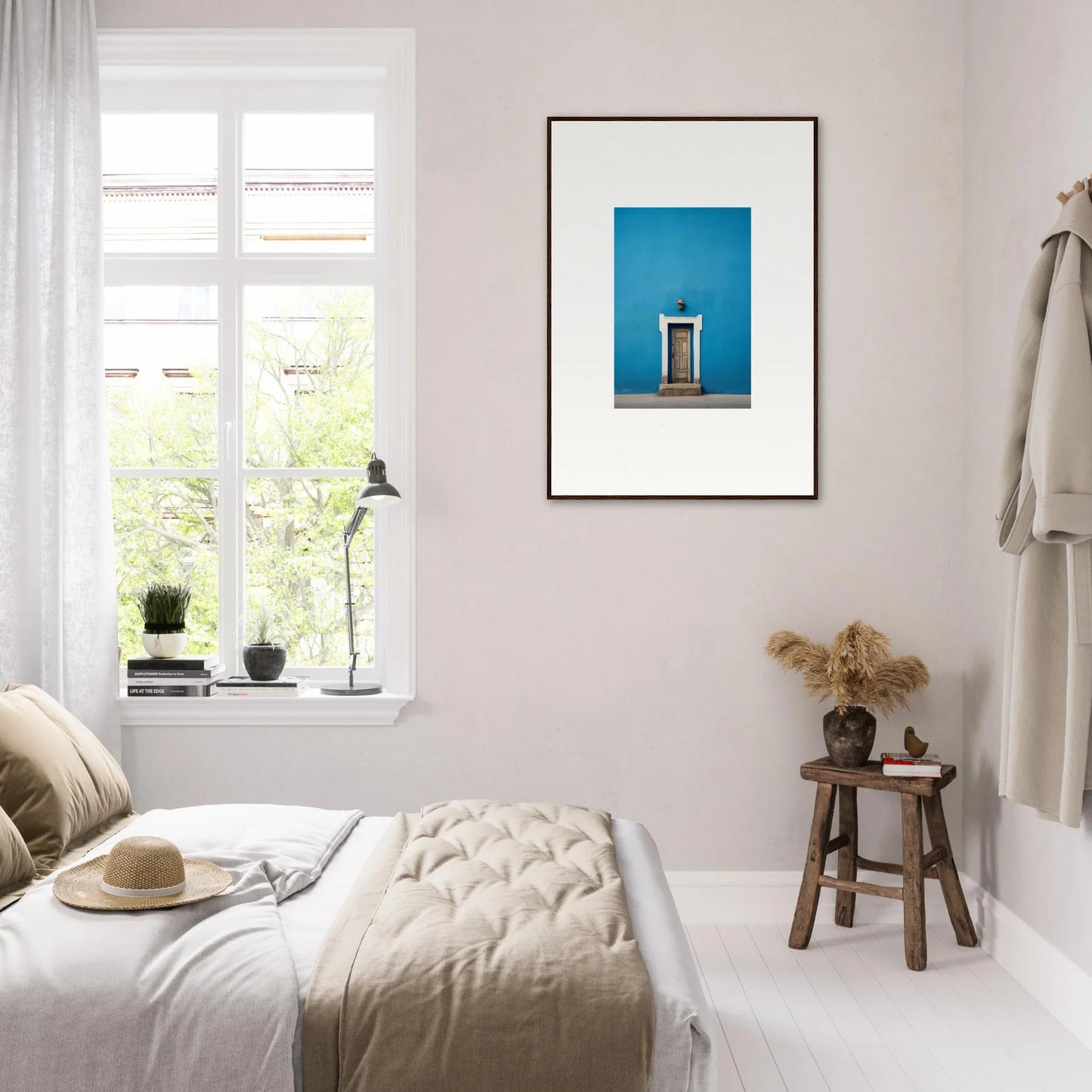 Bright minimalist bedroom featuring the Eternal Cerulean Cloister artwork on the wall