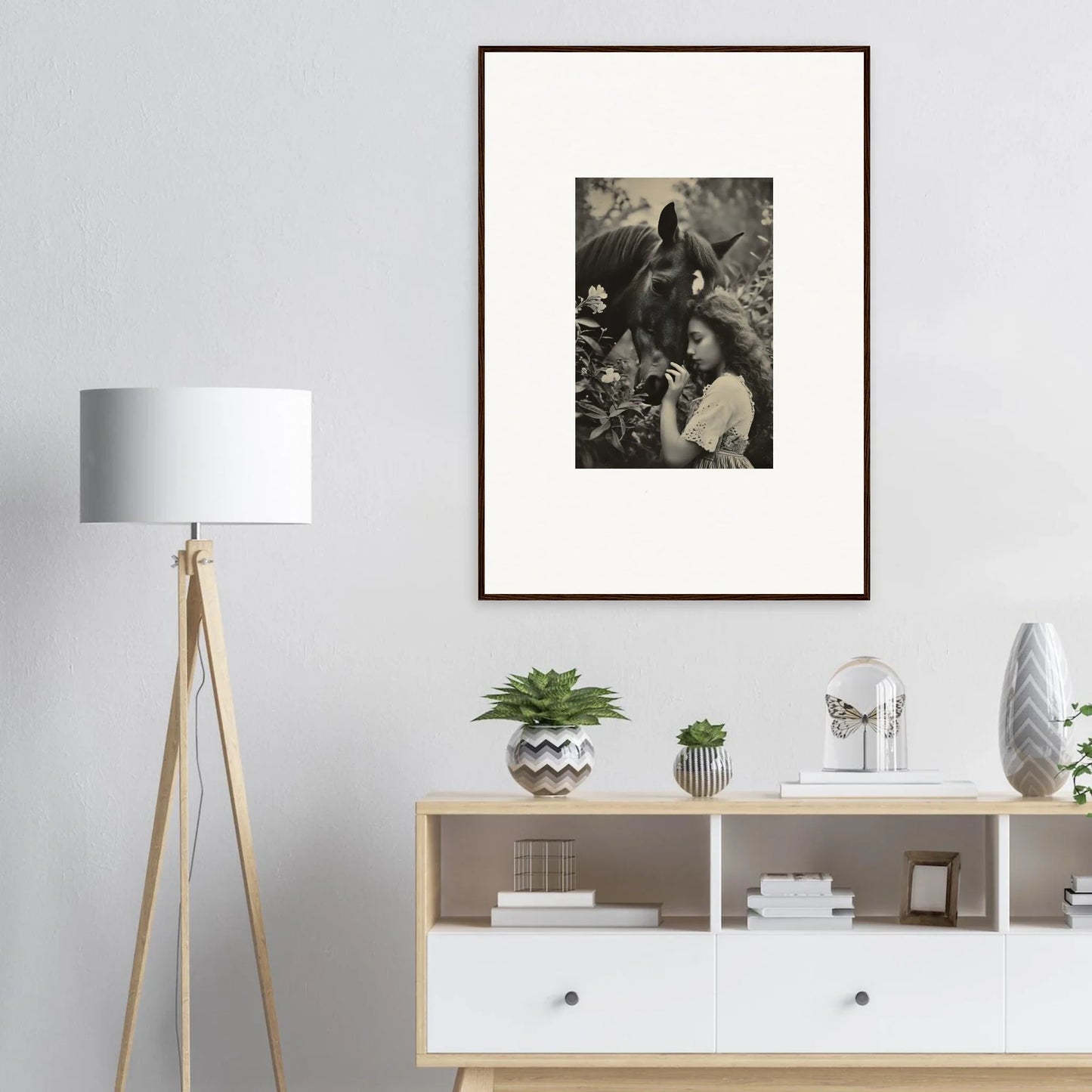 Framed black and white canvas print of figures in nature for cool room decoration