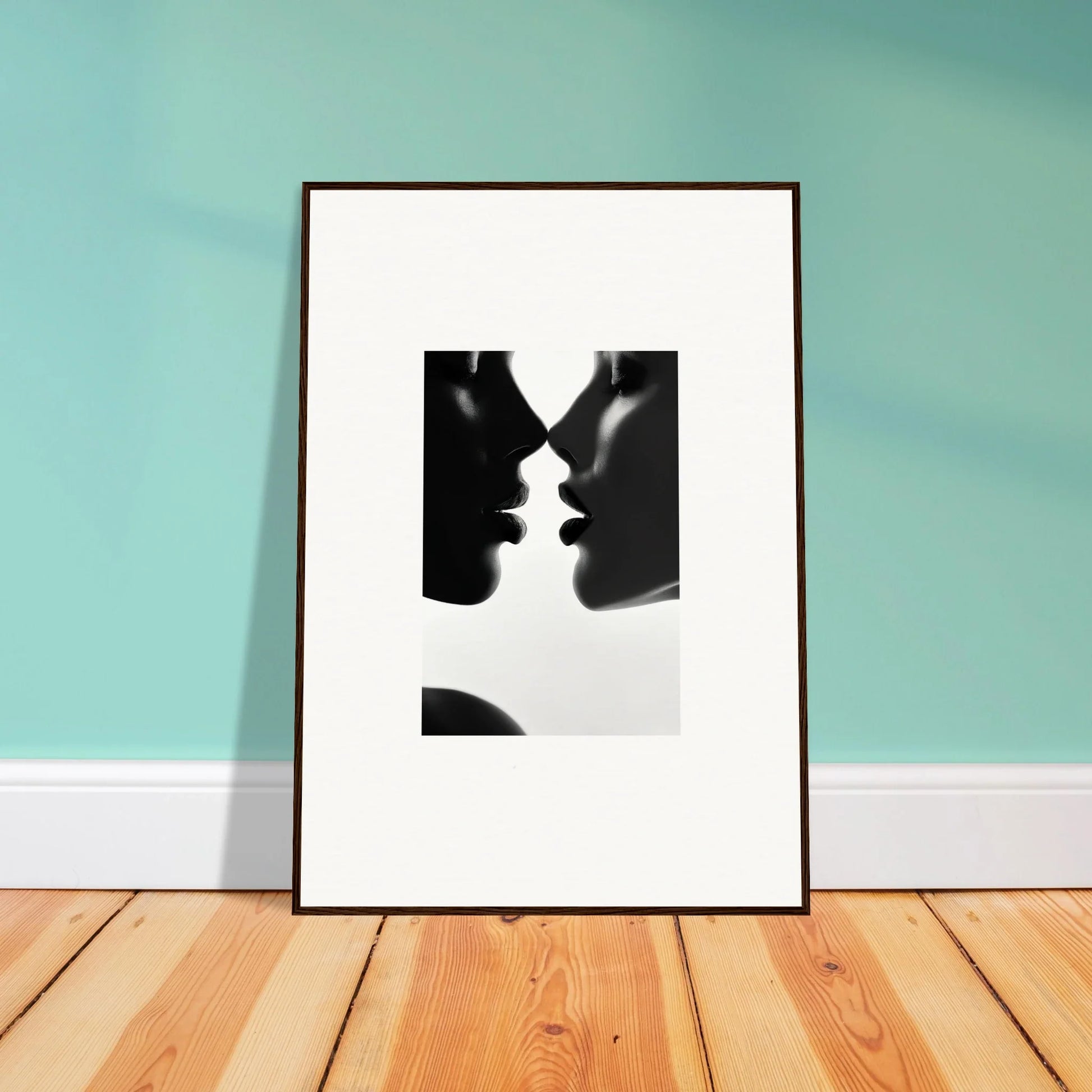 Framed black and white silhouette print of two profiles about to kiss for Lattices of Ephemera