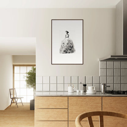 Framed black and white photo of a figure in a gown from Dreams Bloom Eternal collection