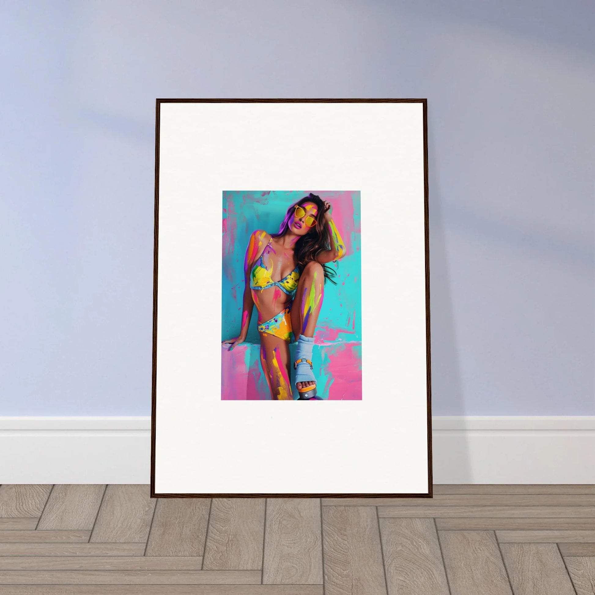 Framed colorful wall art of a woman in a bikini for vibrant room decoration