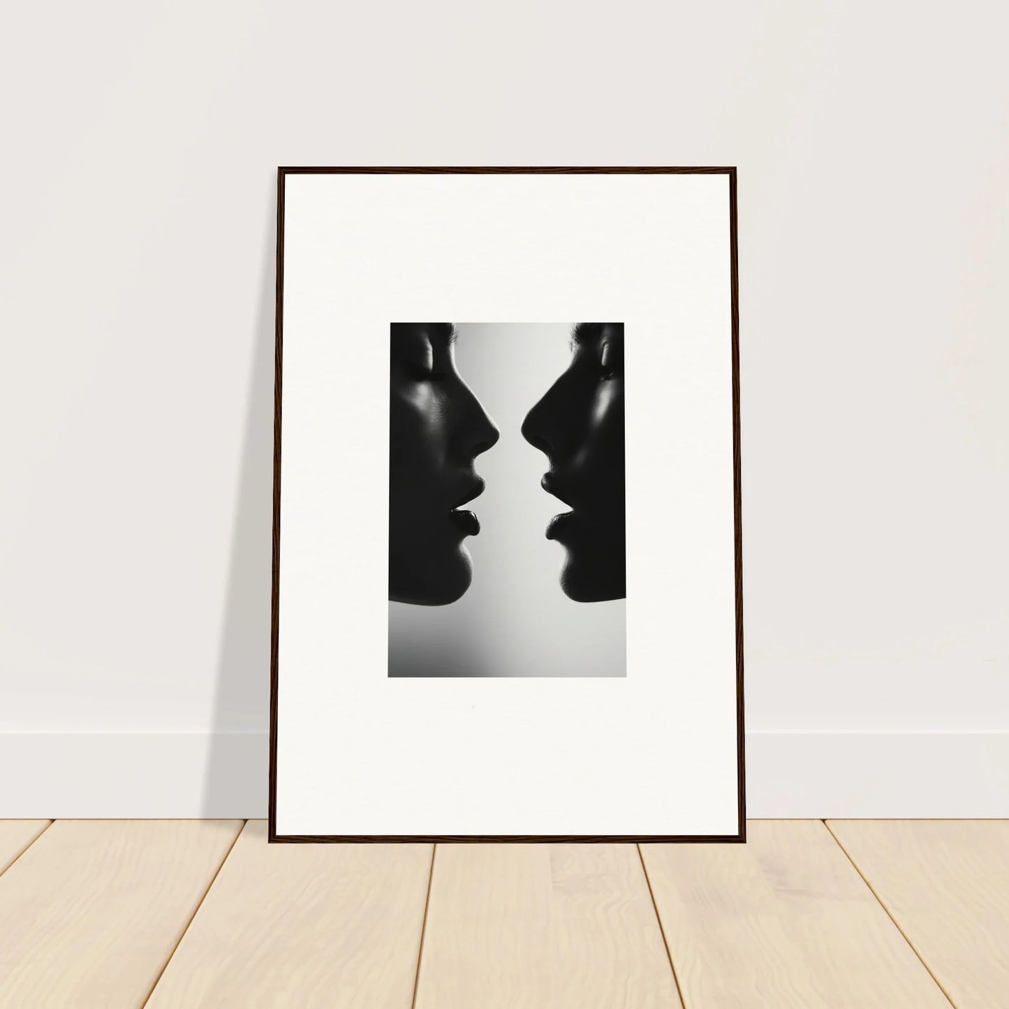 Framed black and white photo of two silhouettes for Symbiotic Echoes Flutter art