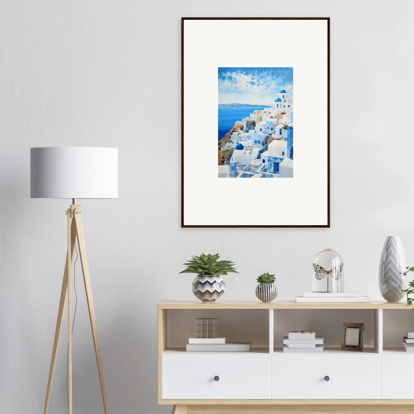 Framed artwork featuring Santorini’s iconic buildings in a special edition art design