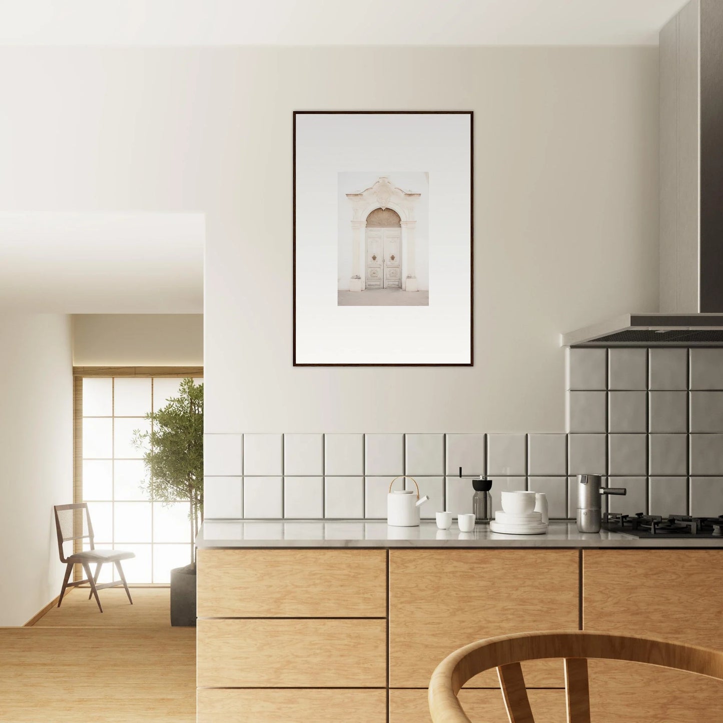 Modern kitchen featuring Faded Elegance Whispers with light wood cabinets and framed wall art