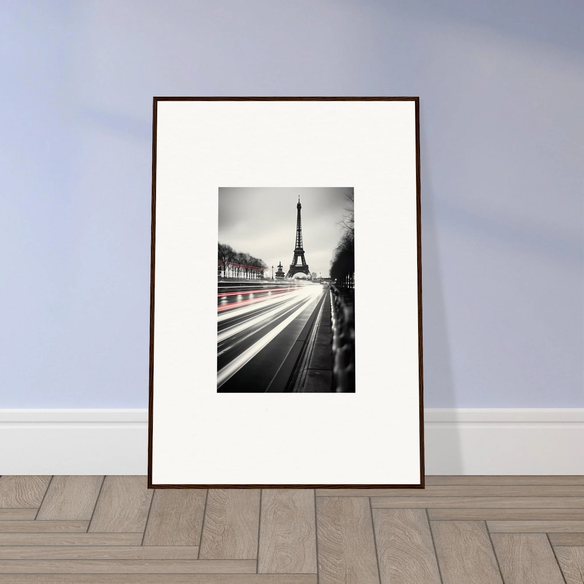 Framed black and white Eiffel Tower photo with light trails in Eternal Windsweep Halo