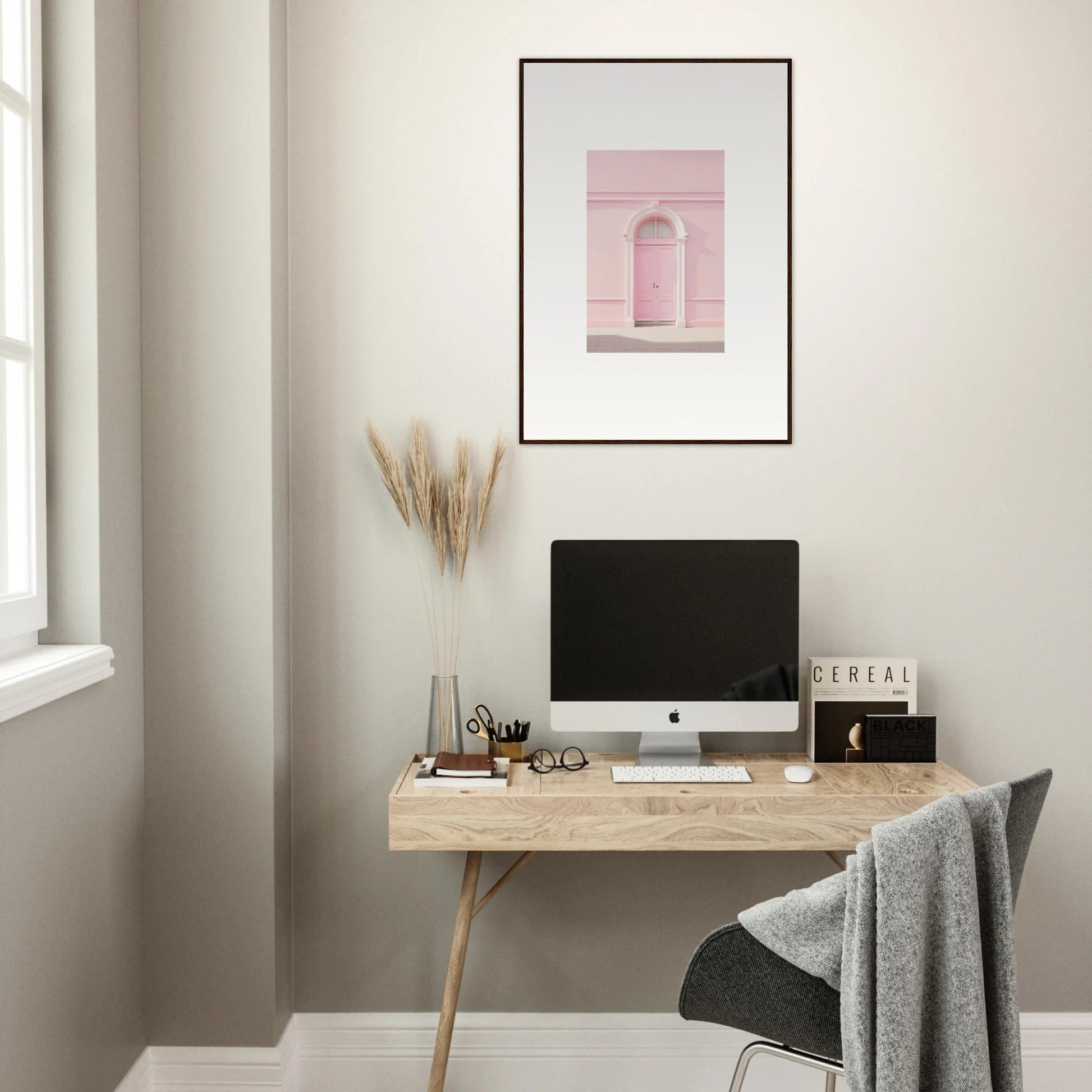 Minimalist wooden desk with iMac and Pearly Baccarat Dream framed wall art above