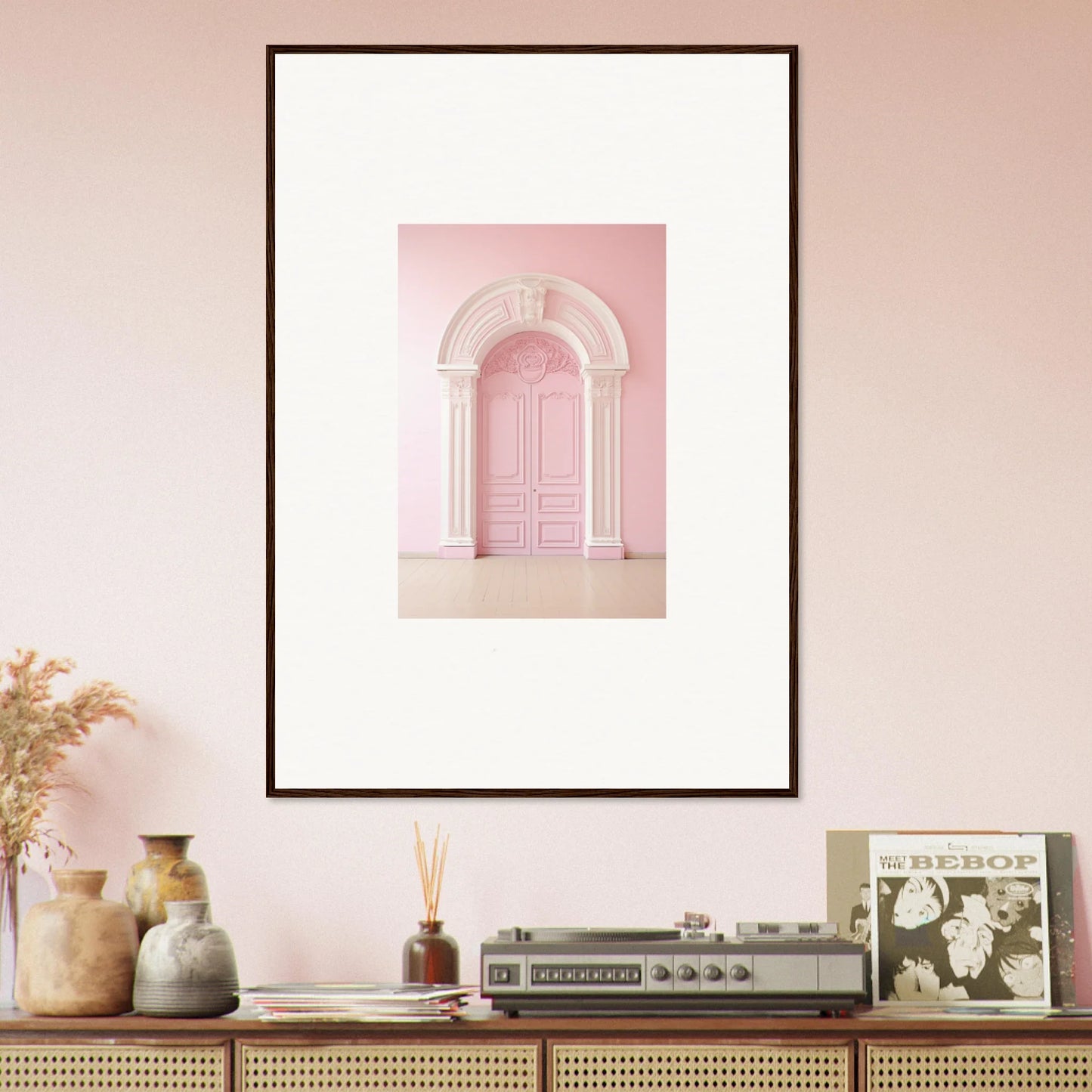 Framed wall art of a pink door with an ornate archway from Portal Fantasies Unfurled