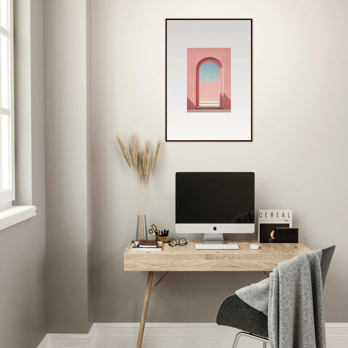 Minimalist wooden desk with iMac, styled with Echo of Horizons special edition art