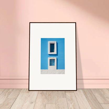 Framed wall art of a white window on a blue wall from Isles Encompassed Vista