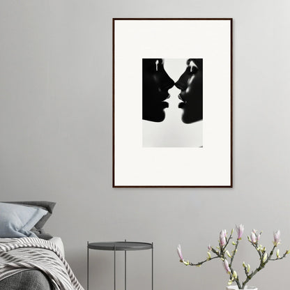 Black and white silhouette of two profiles in Eclipsing Soulcare Kisses framed art