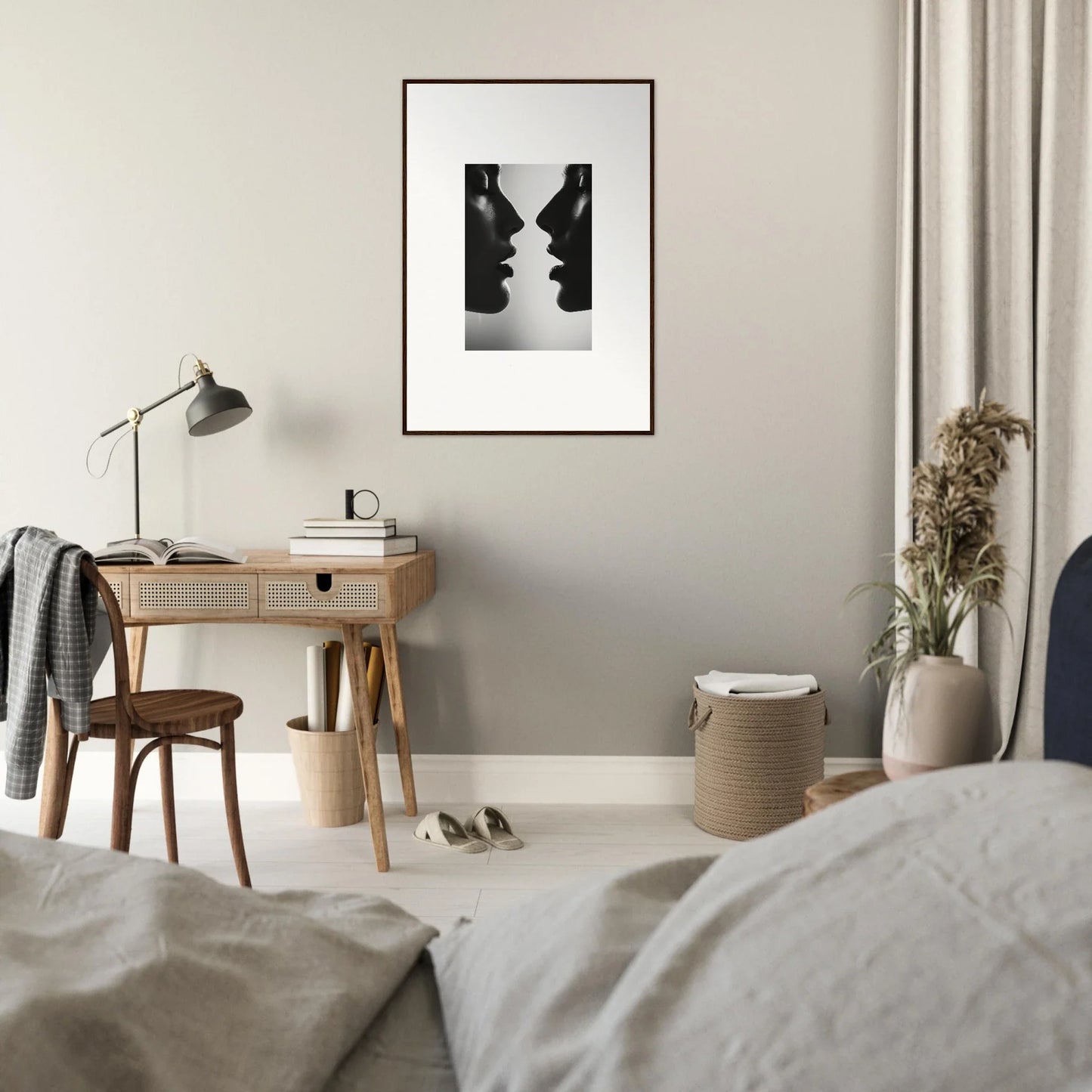 Minimalist black and white silhouette of two faces in profile, Echo’s Embrace special edition art