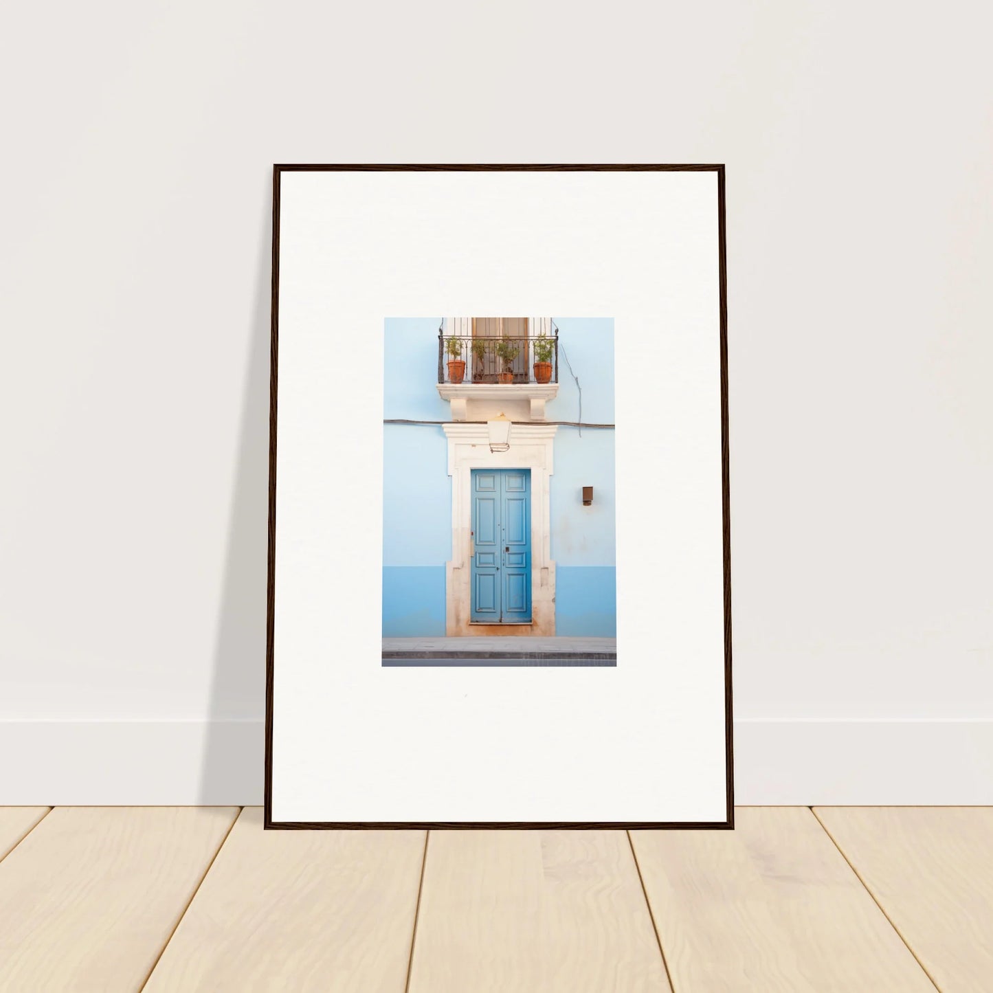 Framed wall art of an Ethereal Azul Entrance featuring a bright blue door and window