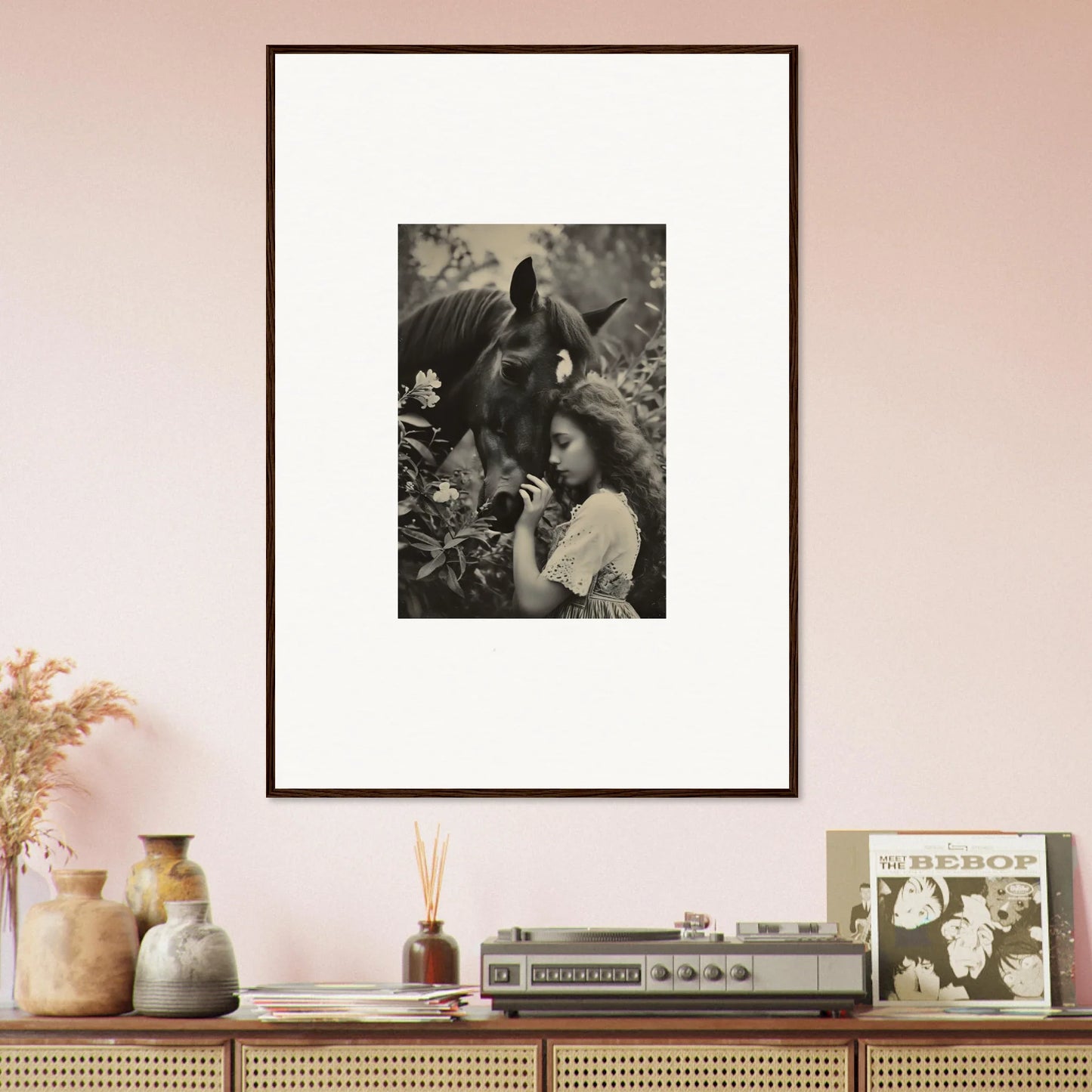 Framed black and white wall art of a person and horse for cool room decoration