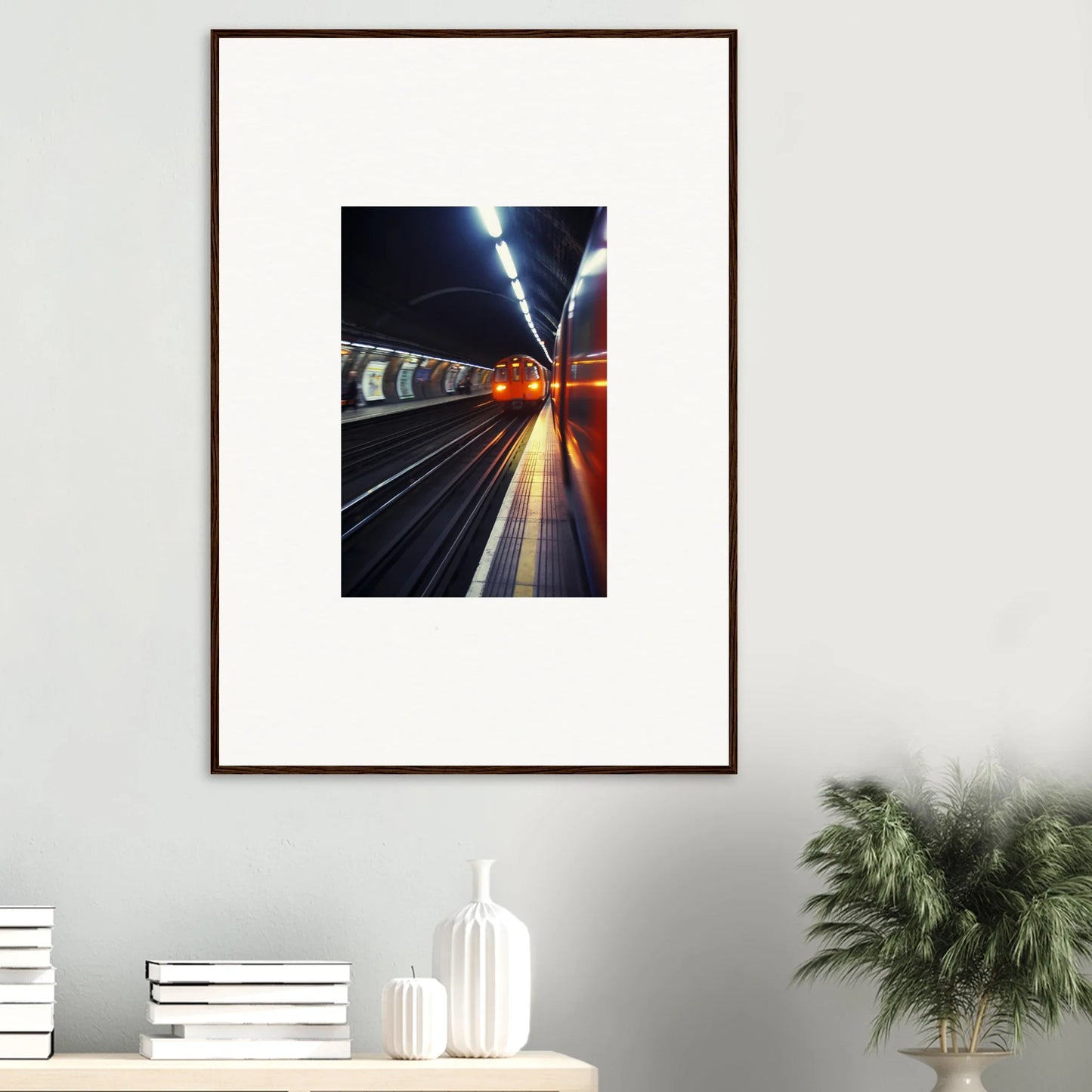 Framed photograph of an illuminated subway platform showcasing Threads Passagesquent Hues