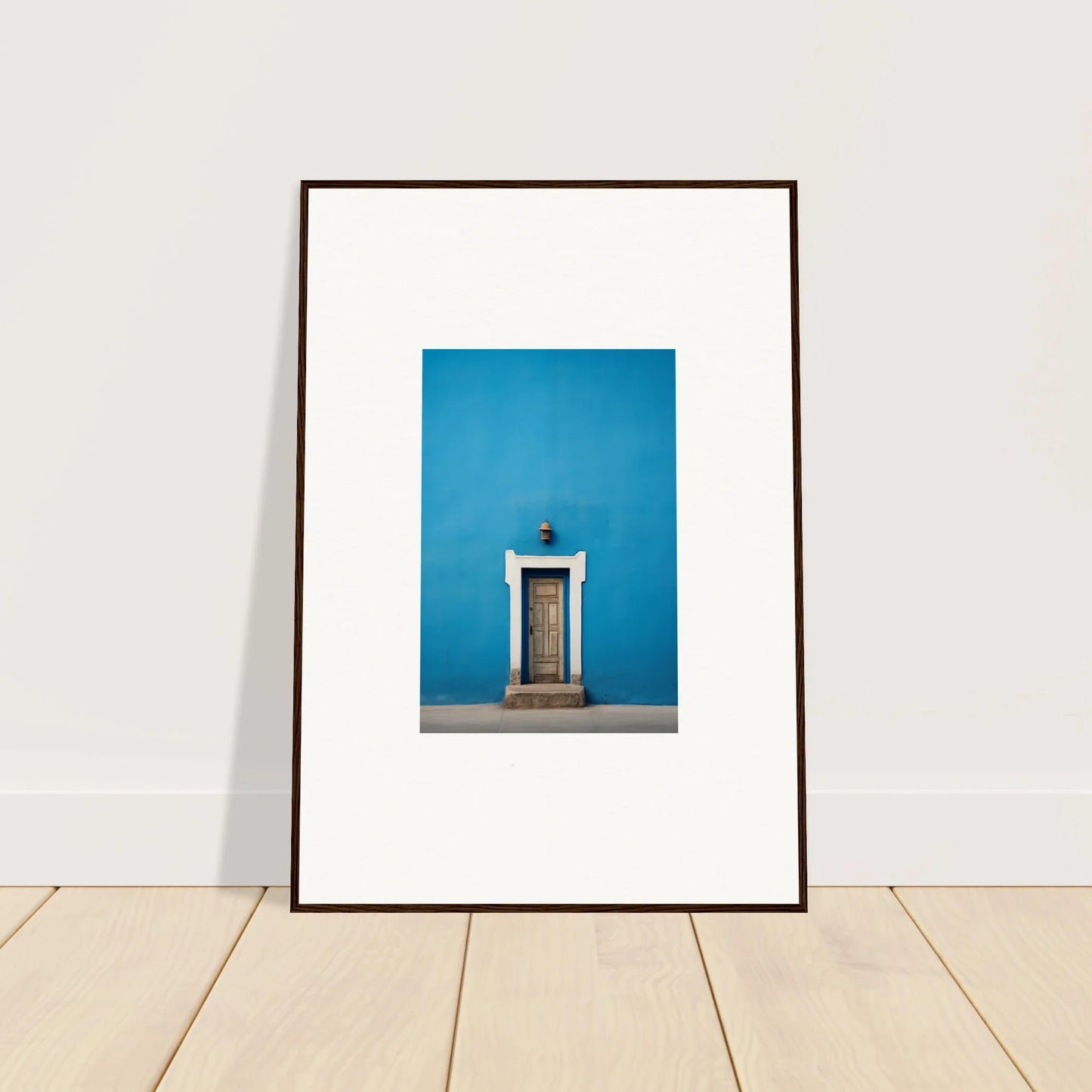 Framed photo of a white door on a bright blue wall from Eternal Cerulean Cloister