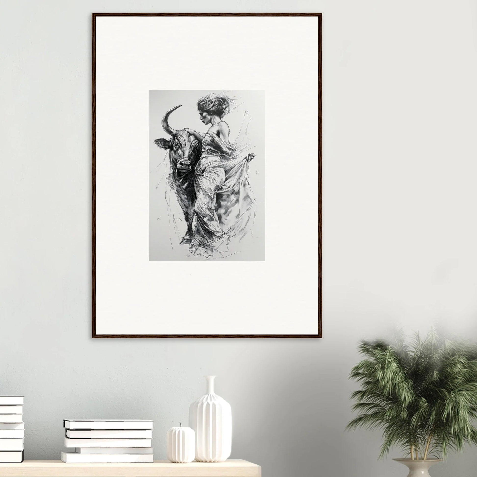 Framed black and white art of a figure and bull in Marvelous Taurine Serenade