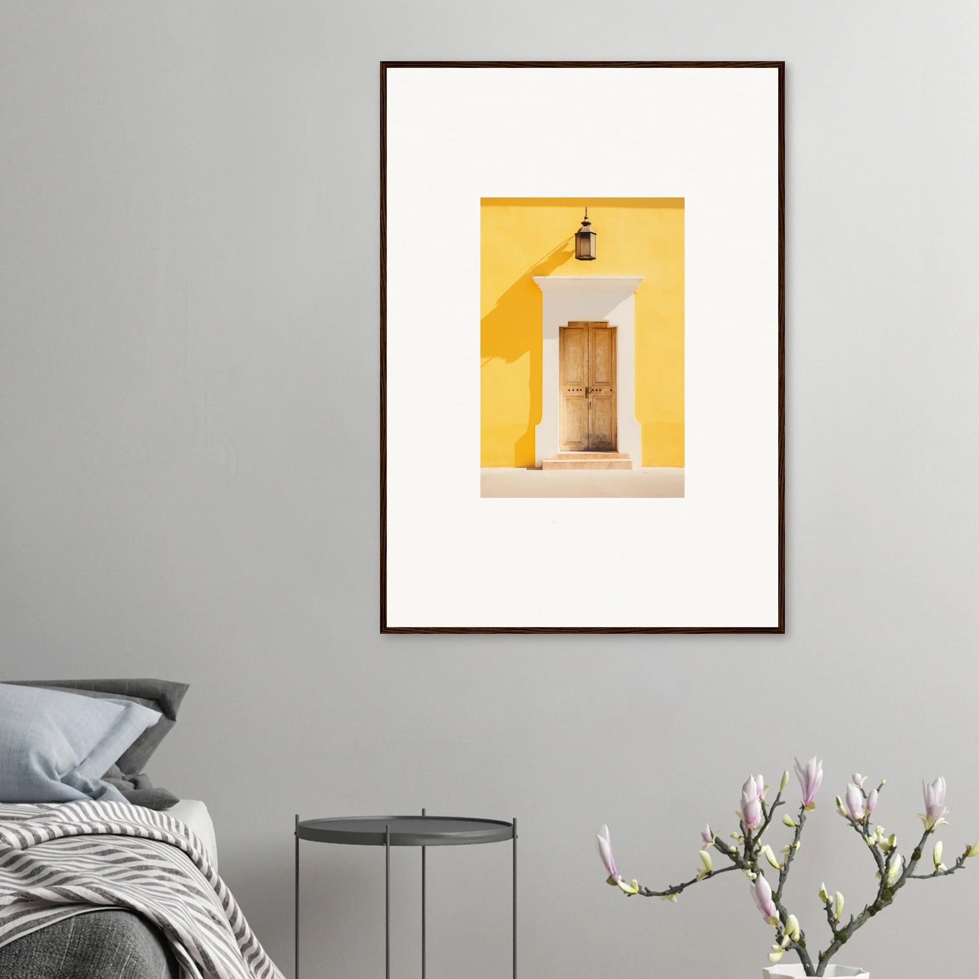 Framed wall art of a wooden door on a bright yellow wall in Golden Hue Portal