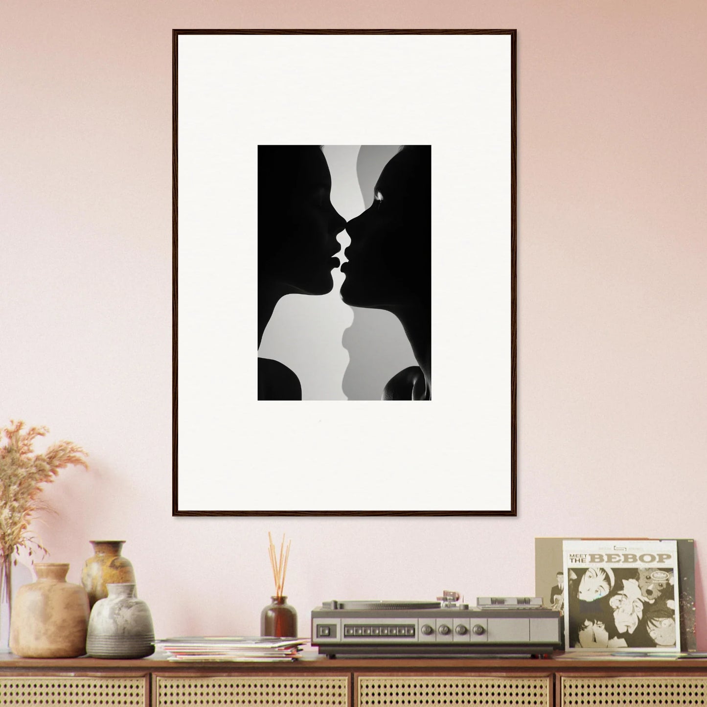 Black and white silhouette of two profiles kissing in Nouveau Love Symphony framed wall art