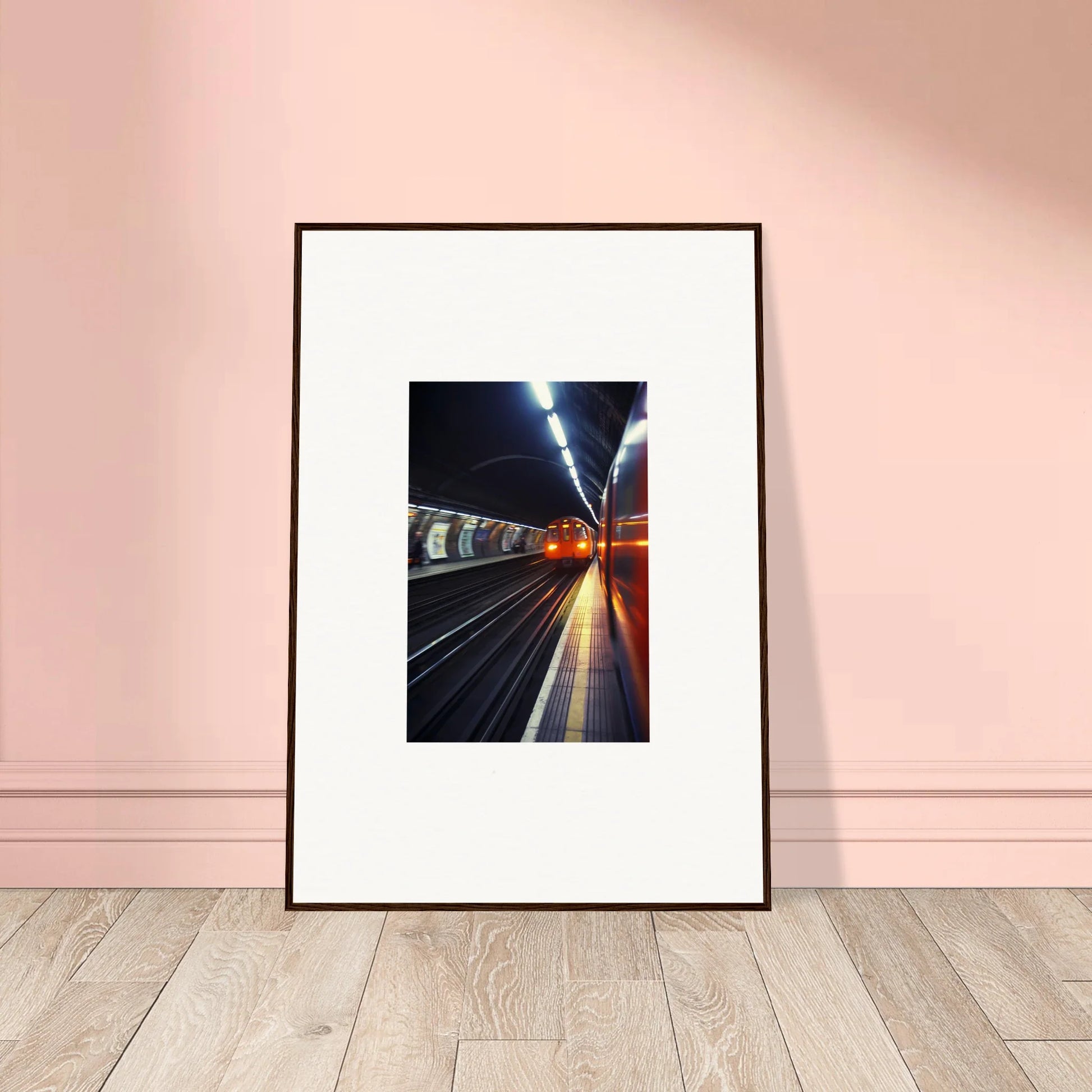 Framed photograph of an illuminated subway tunnel platform in Threads Passagesquent Hues