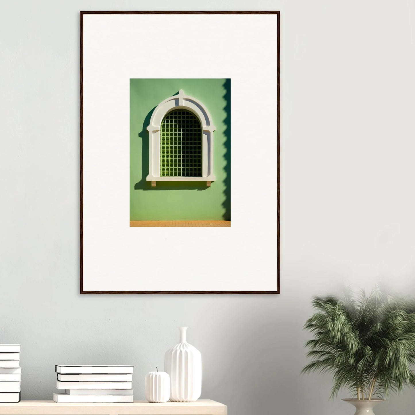 Arched Visible Equilibrium Window with decorative grating on a green wall