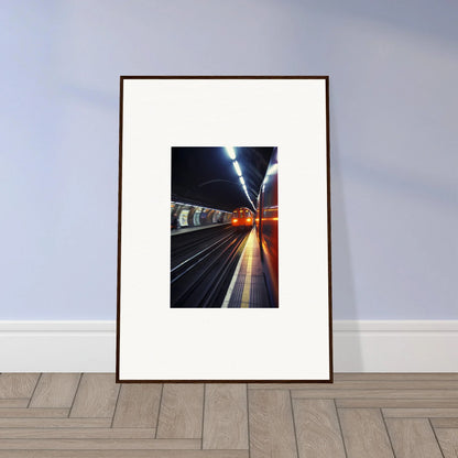 Framed photo of an illuminated subway platform, part of Threads Passagesquent Hues special edition art™