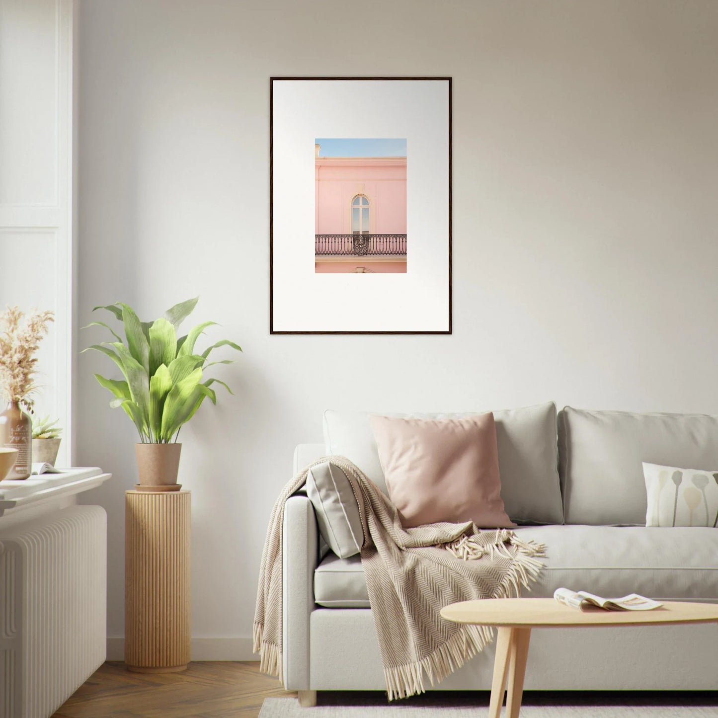 Framed wall art of a balcony with peach tranquil portal vibe against a pink wall