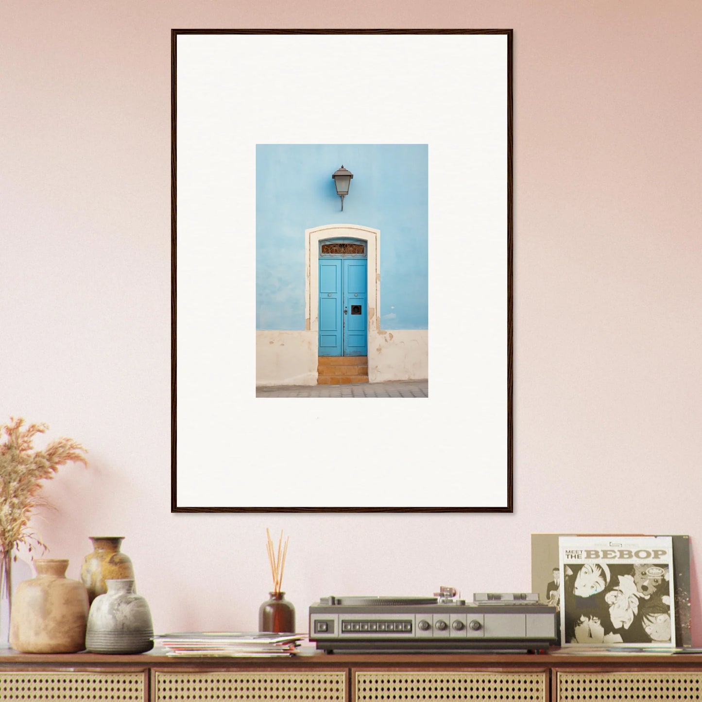 Framed wall art featuring a bright blue door on a light blue wall, Surreal Azure Vesaurrezz