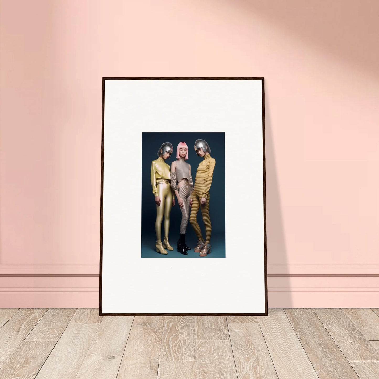 Framed wall art of three figures in metallic bodysuits from Galactic Fashion Paradigm