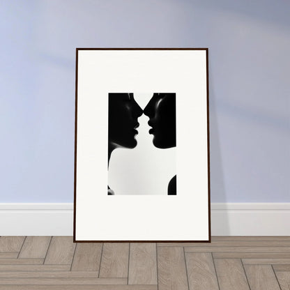 Framed black and white silhouette art of profiles from Shadowed Sédual Symphony