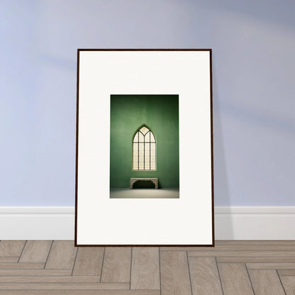 Framed photo of an arched church window with a bench under Evermind Greenthaum