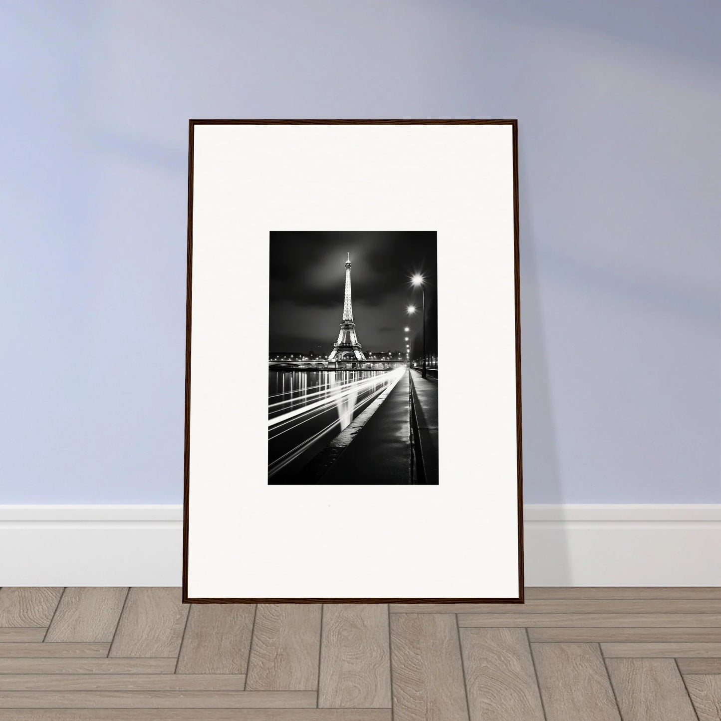 Framed black and white photo of the Eiffel Tower at night in exclusive Ghosts of Luminosity