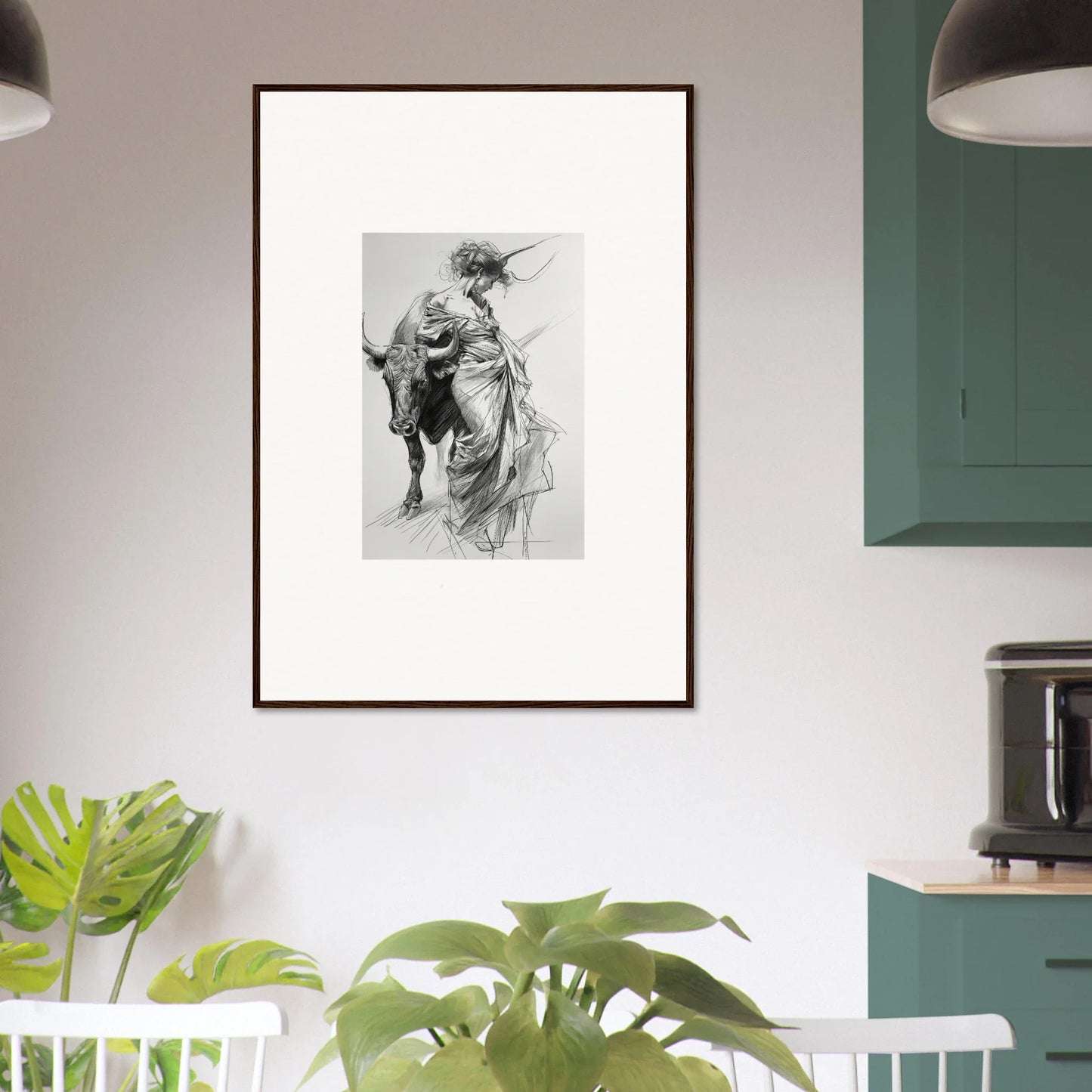 Framed black and white art of a classical figure dancing flamenco with a bull