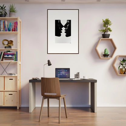 Modern home office with a dark desk, wooden chair, and Whispers Kiss Universes art