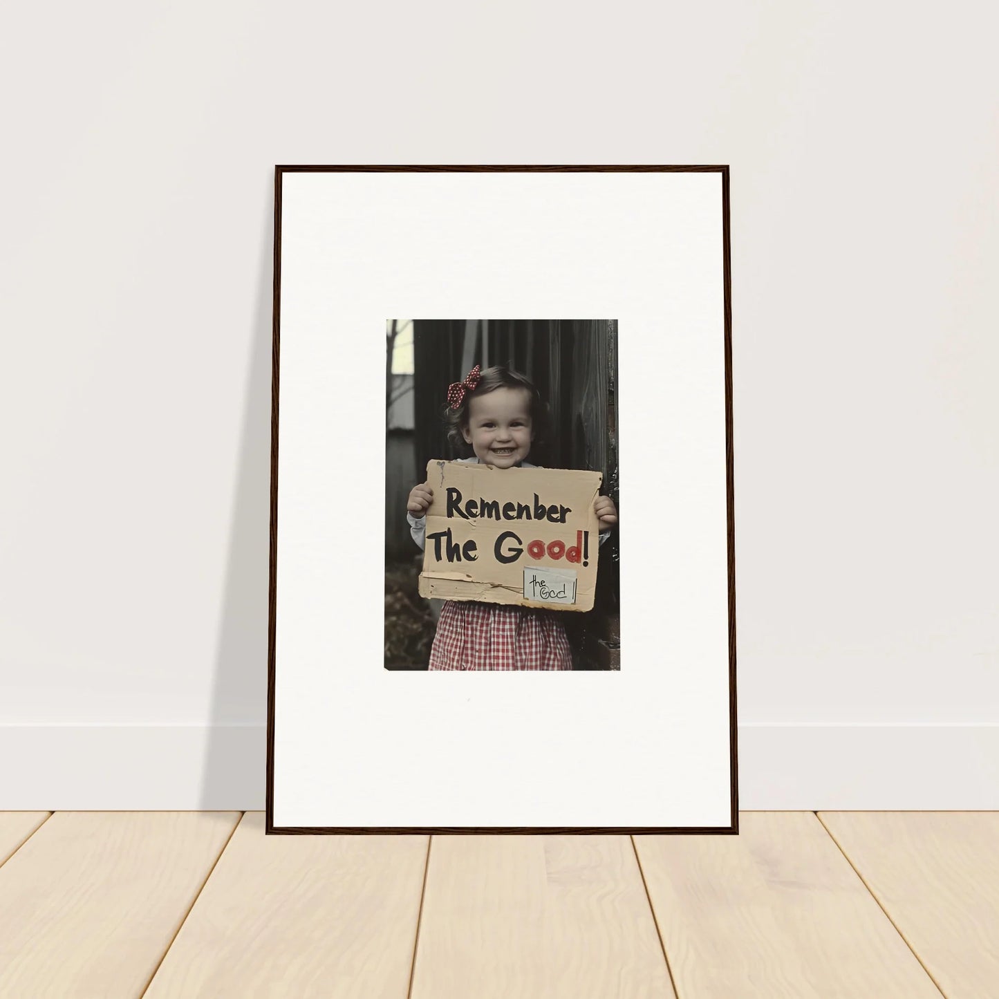 Framed black and white photo of a sign saying Remember The Good in Smiles Forlornly Singing