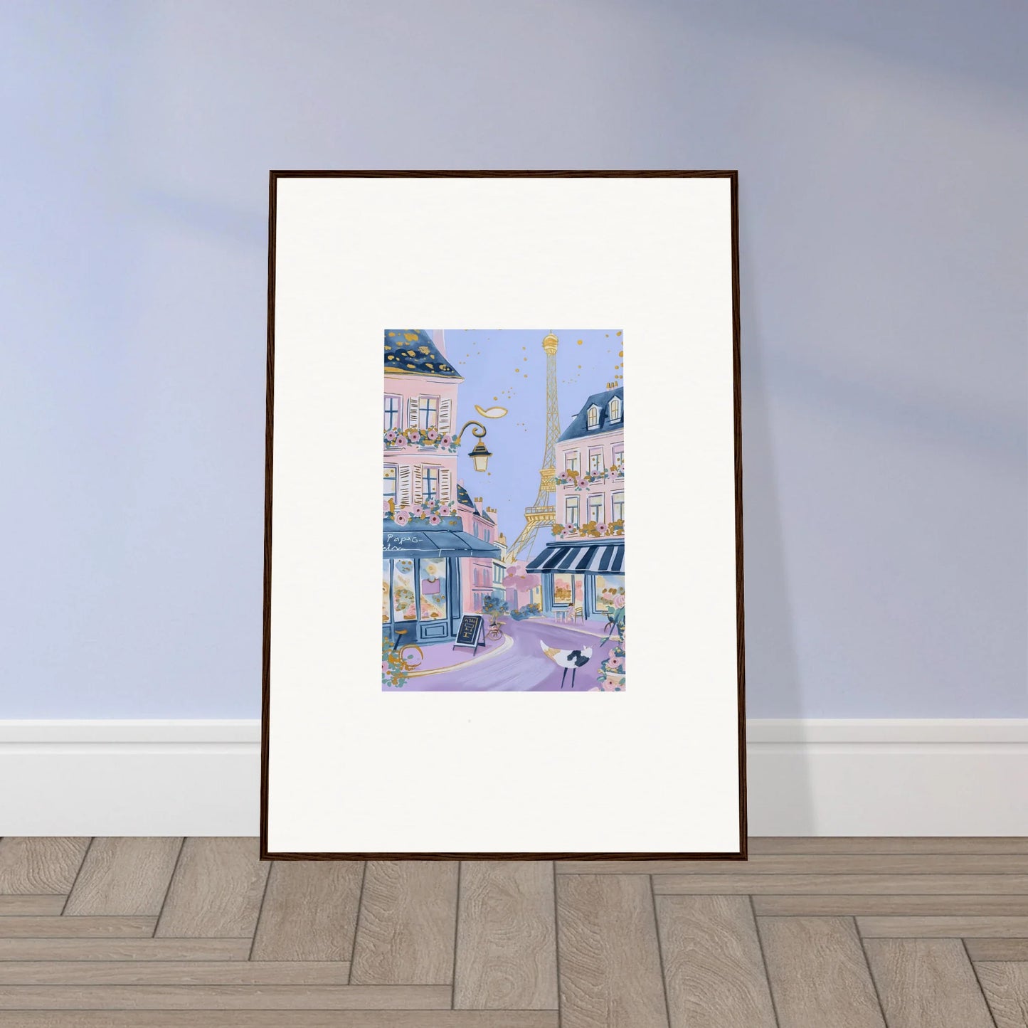 Framed wall art of a whimsical Parisian street scene from Hat Lemons Paris