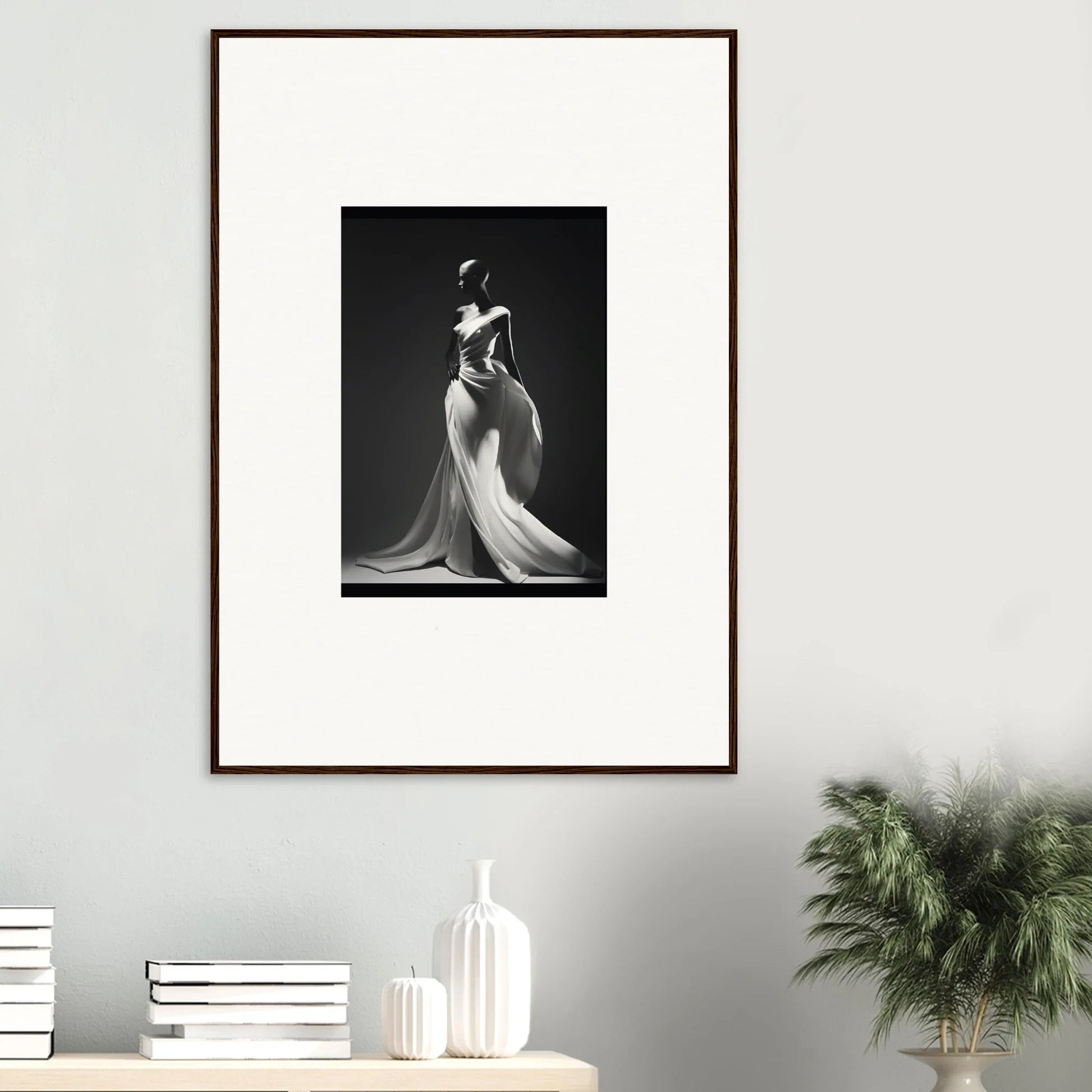 Framed black and white photo of a figure in Gossamer Ivory Whispers flowing gown